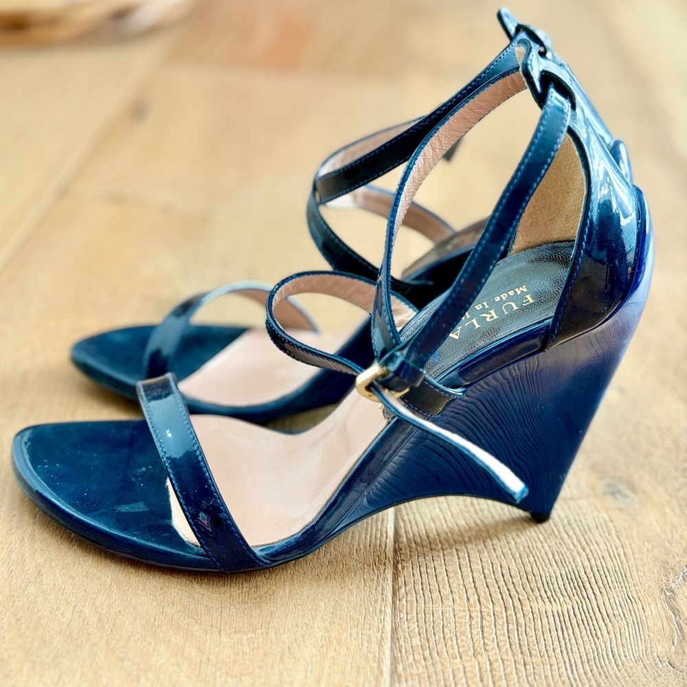 NWOT. Furla platform heels with ankle strap in blue. Size 6. Never worn!!